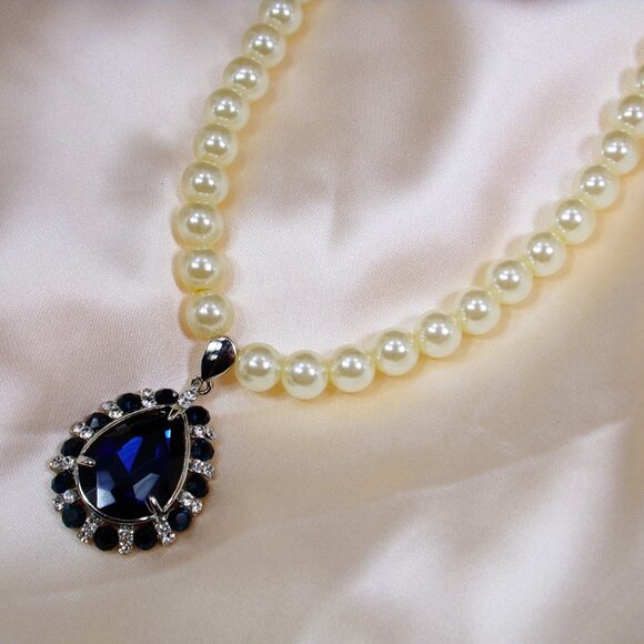 Pearl bead and crystal pendant necklace made with a blue teardrop crystal - Picture 6 of 7